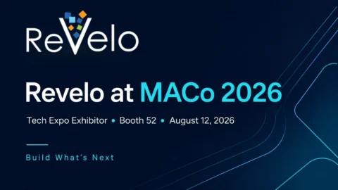 Promotional graphic for Revelo at MACo 2026 on a dark navy background with bright blue geometric lines. Text reads, “Revelo at MACo 2026,” followed by “Tech Expo Exhibitor, Booth 52, August 12, 2026,” and the conference theme, “Build What’s Next.”